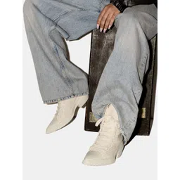 Converse Women Textured Leather Pointed Toe Leather High-Top Sneakers